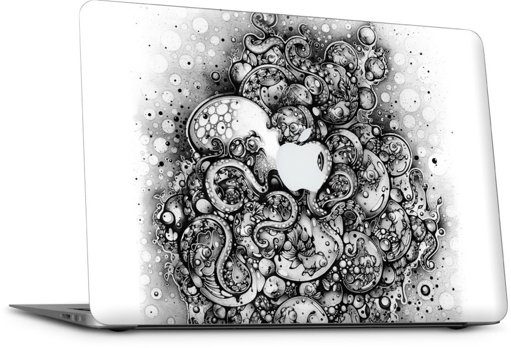 A Curious Embrace MacBook Skin